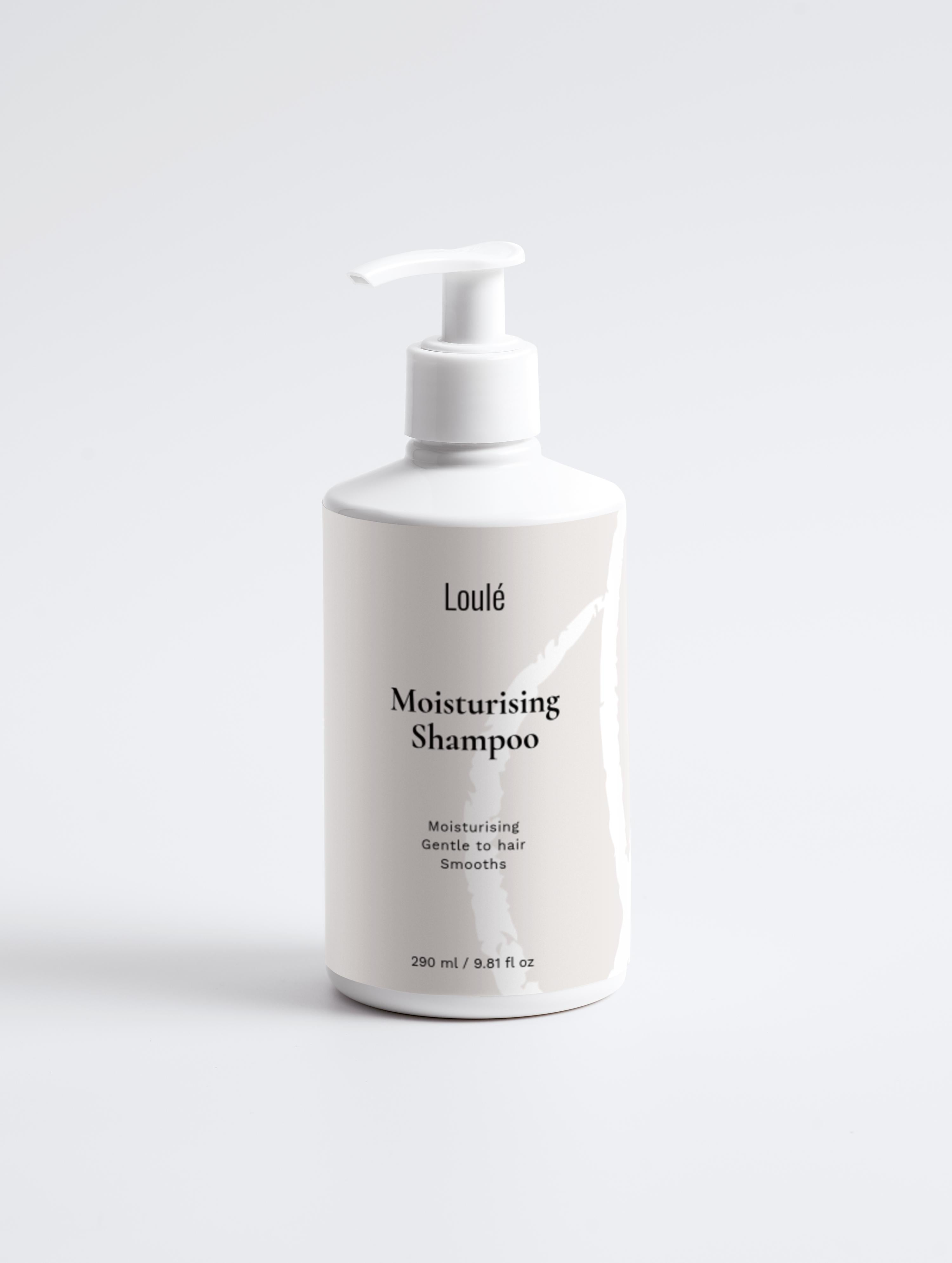 Loulé Moisturising Shampoo in white pump bottle, designed for gentle hair care with aloe juice for hydration and smooth, glossy results.