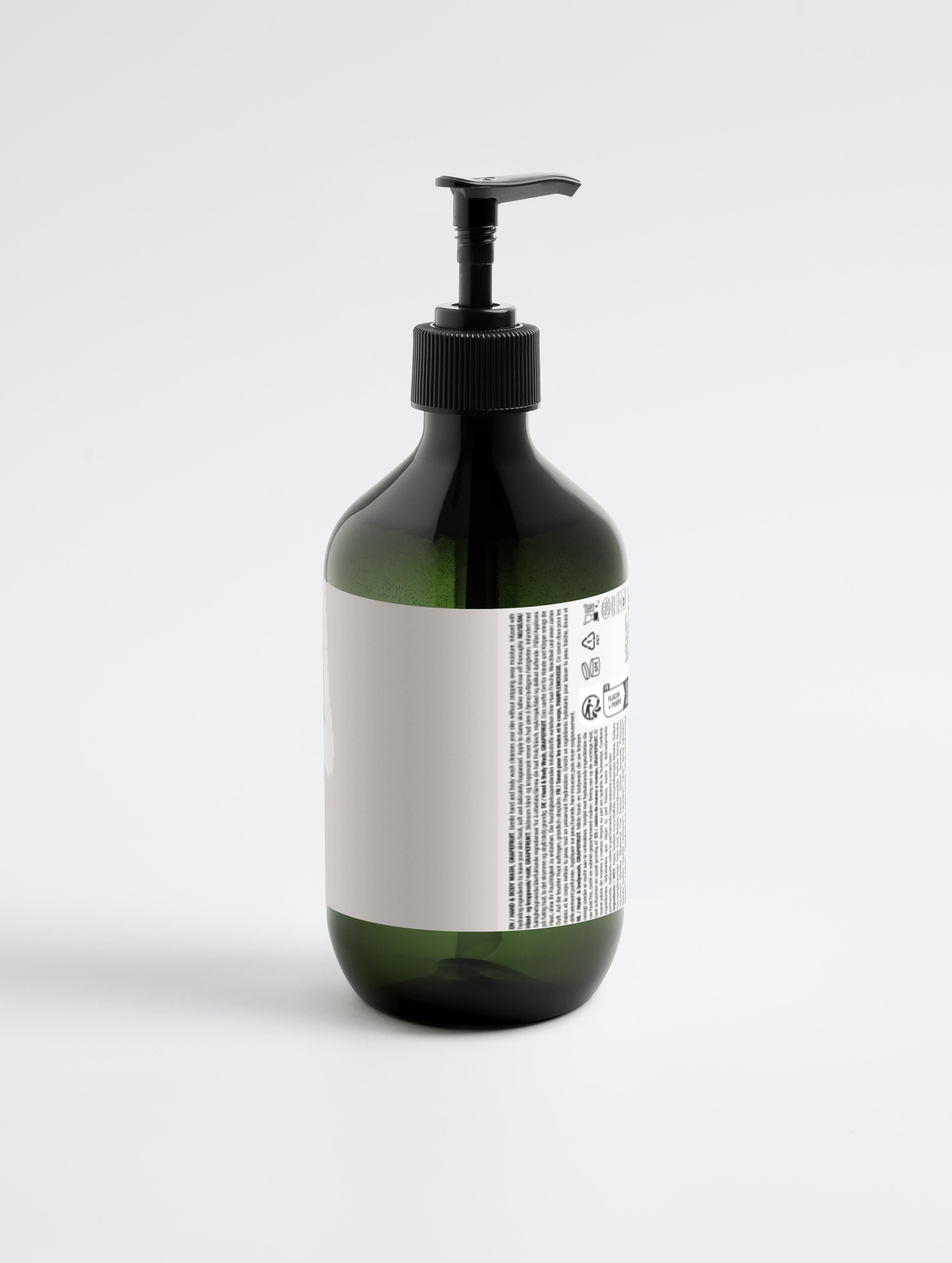 Hand & Body Wash, Grapefruit in green pump bottle with minimalist label, ideal for hydrating and cleansing all skin types. Vegan and gentle formula.